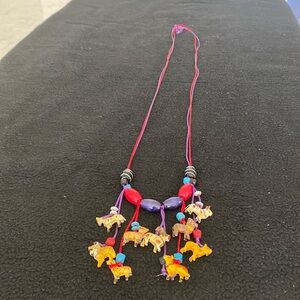 Vintage  carved wood animal and beaded necklace.
